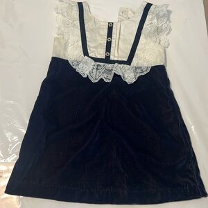 New dress. Janie and Jack. Came with red marks on it. Never worn